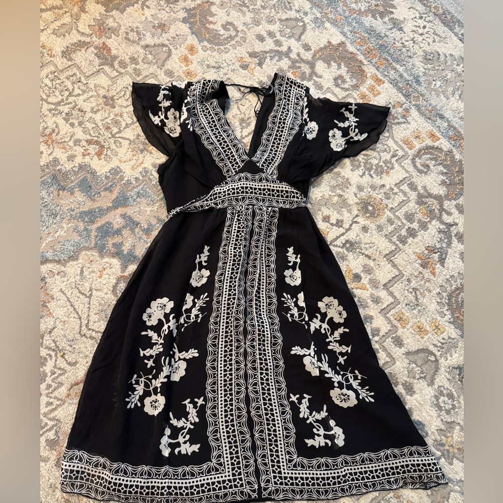 Elegant Black and White Embroidered look sheer dress